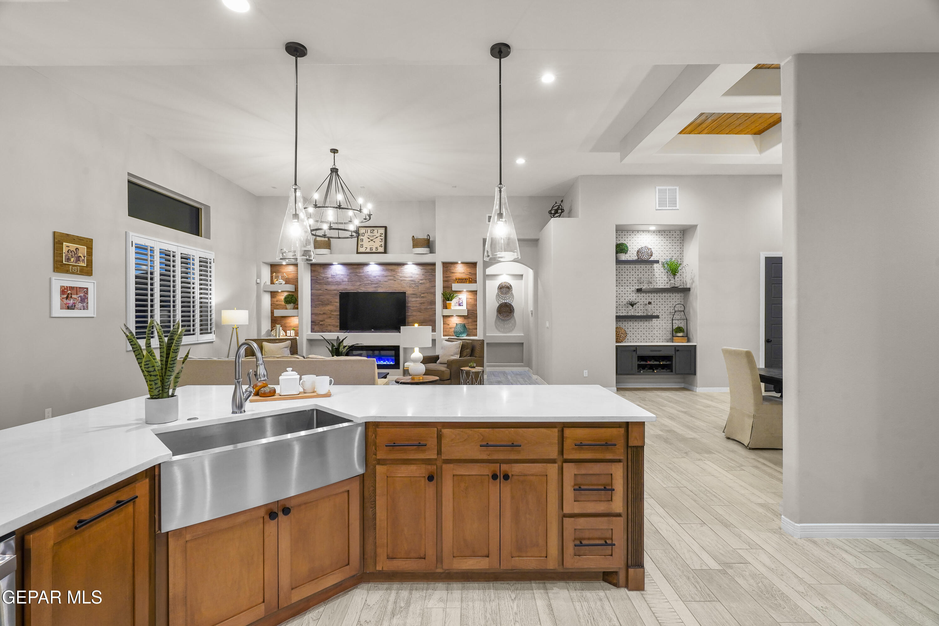 320 Emerald Rise Drive El Paso, TX 79928 - Photo 9 of 29 a kitchen with stainless steel appliances granite countertop a sink counter space and wooden floor