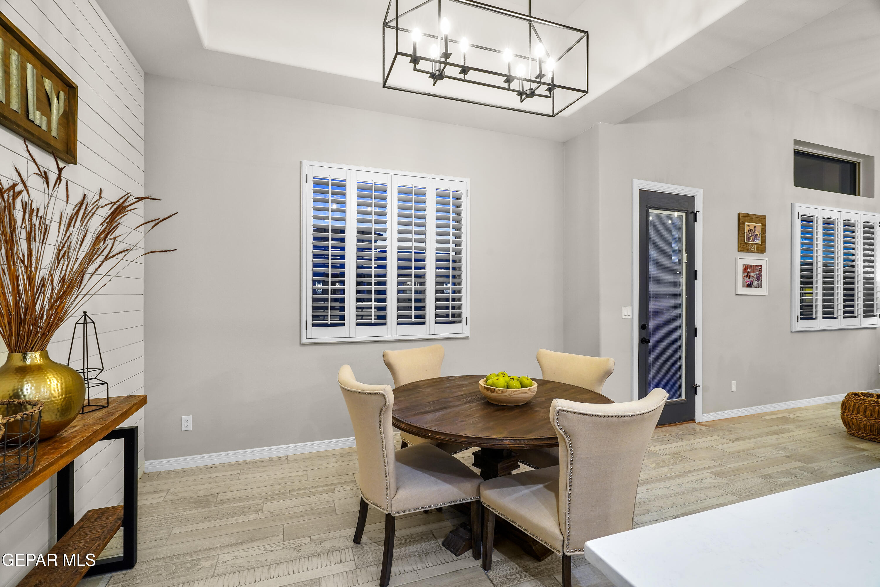 320 Emerald Rise Drive El Paso, TX 79928 - Photo 10 of 29 a view of a dining room with furniture and wooden floor
