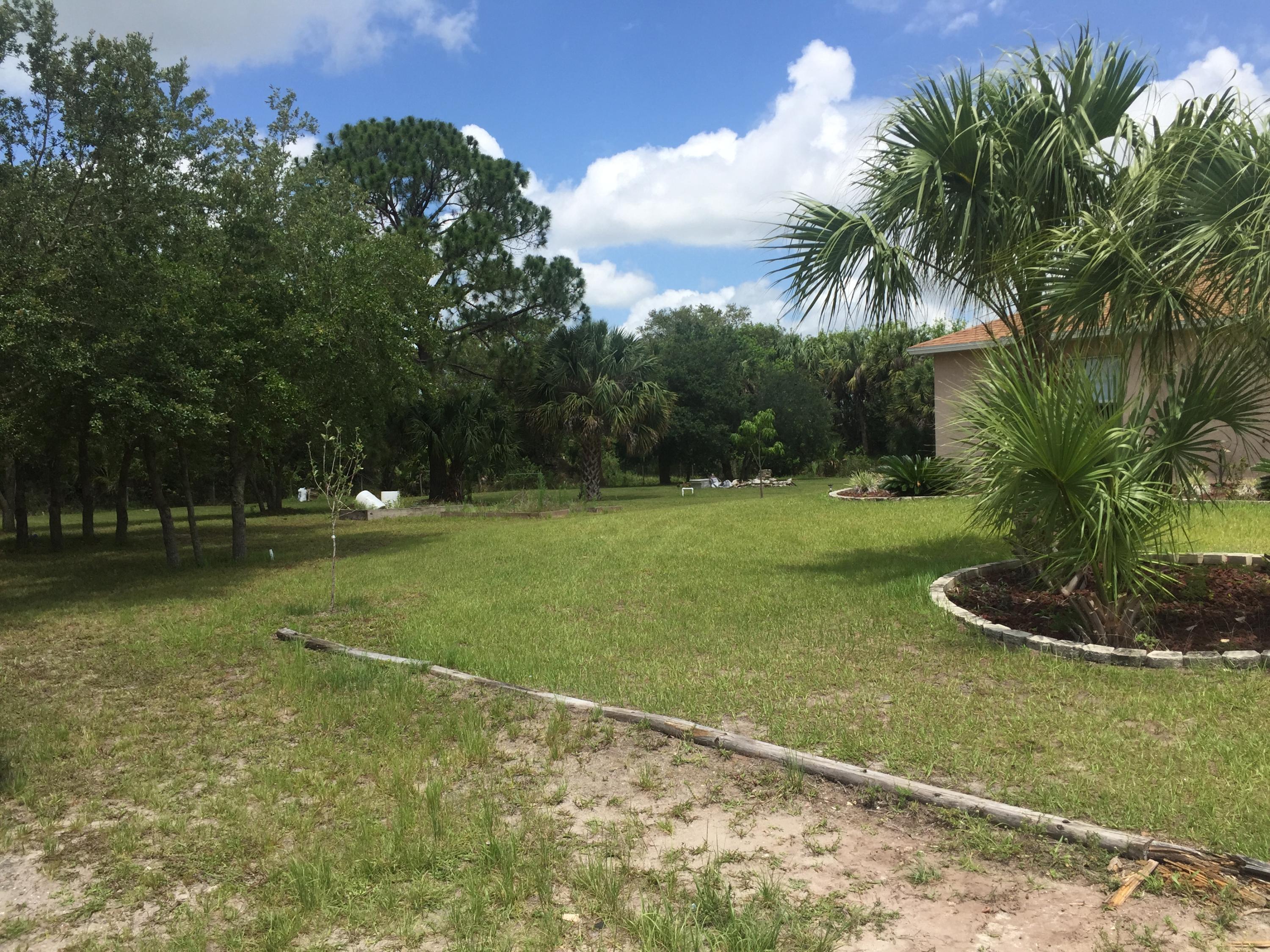 2181 South Brocksmith Road Fort Pierce, FL 34945 - Photo 20 of 31 Front yard