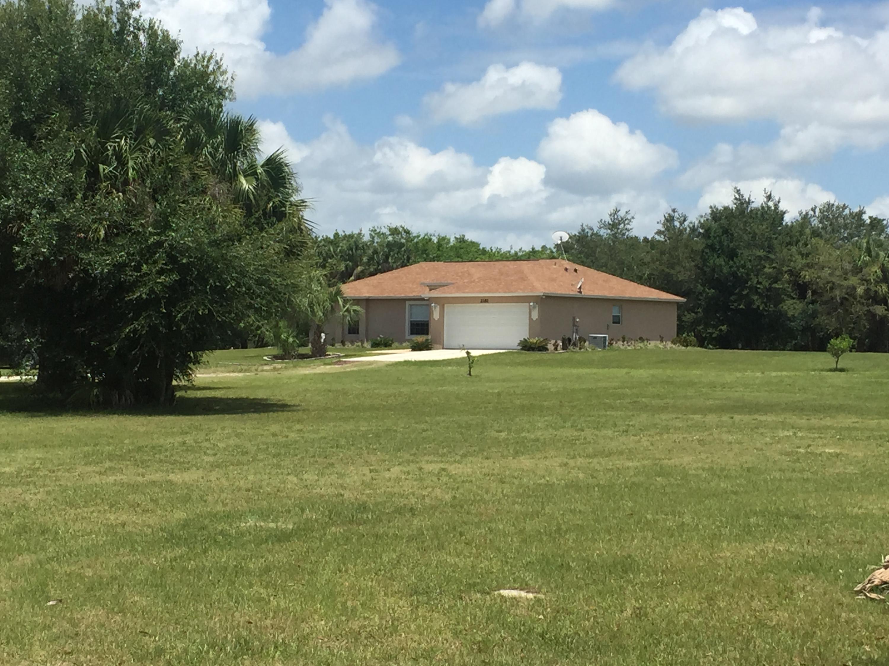 2181 South Brocksmith Road Fort Pierce, FL 34945 - Photo 3 of 31 Exterior front