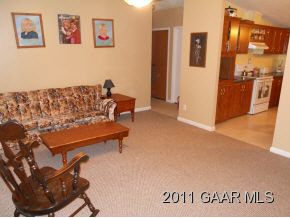 81 Free Mason Run Road Mount Solon, VA 22843 - Photo 4 of 5 a living room with furniture and a refrigerator