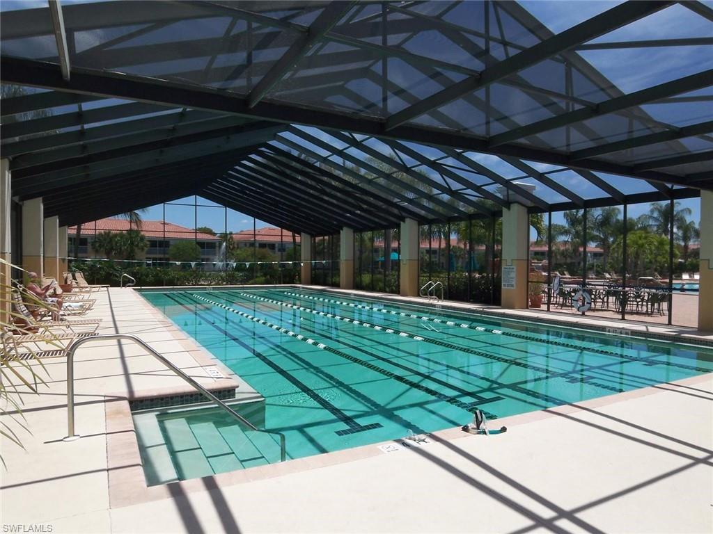 10215 Cape Roman Road, Unit 101 Estero, FL 34135 - Photo 35 of 50 a view of swimming pool with a patio