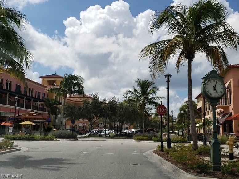 10215 Cape Roman Road, Unit 101 Estero, FL 34135 - Photo 46 of 50 a view of street with cars