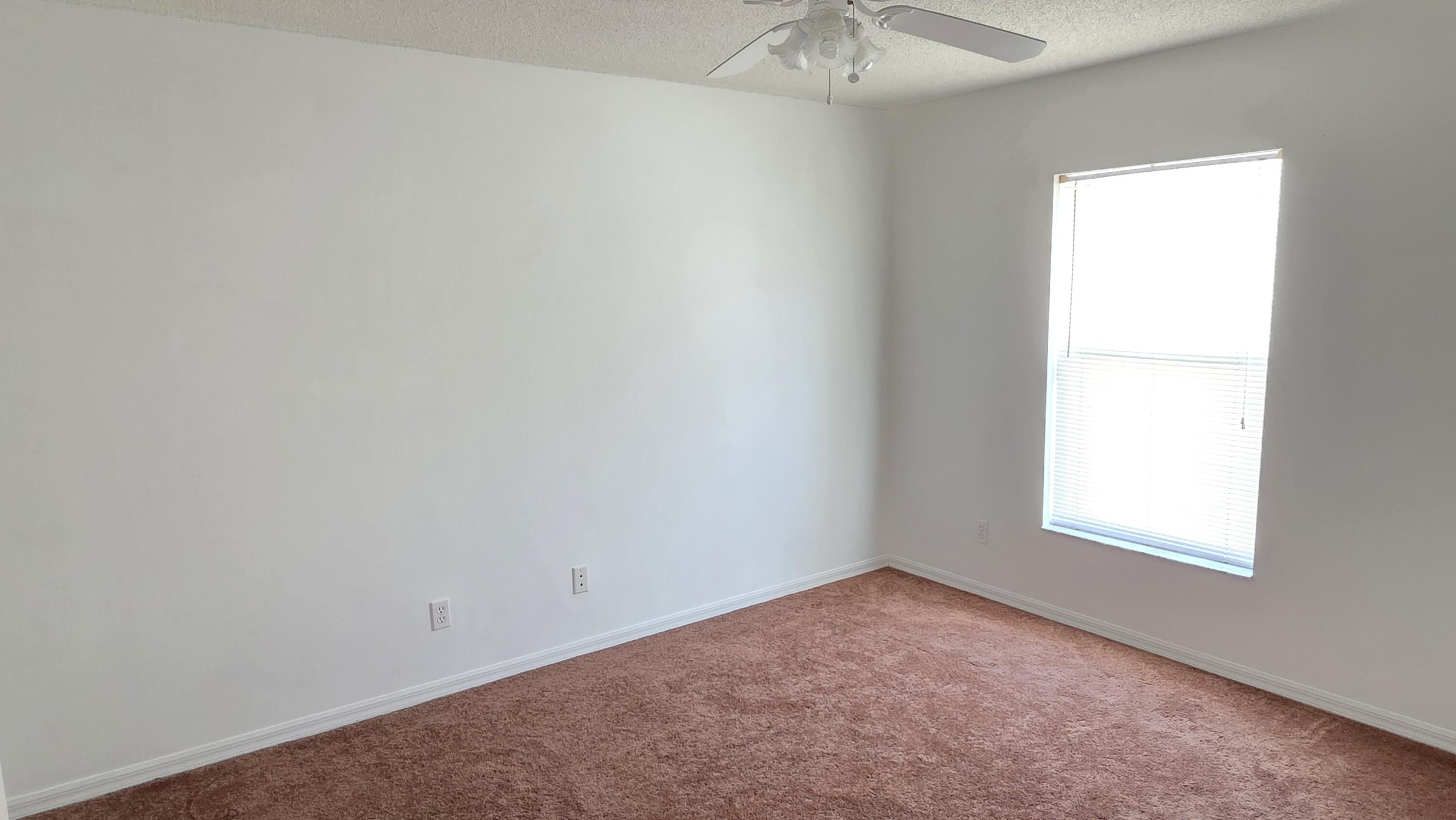 6448 Northwest Colgate Street Port St. Lucie, FL 34986 - Photo 16 of 21 an empty room with a window