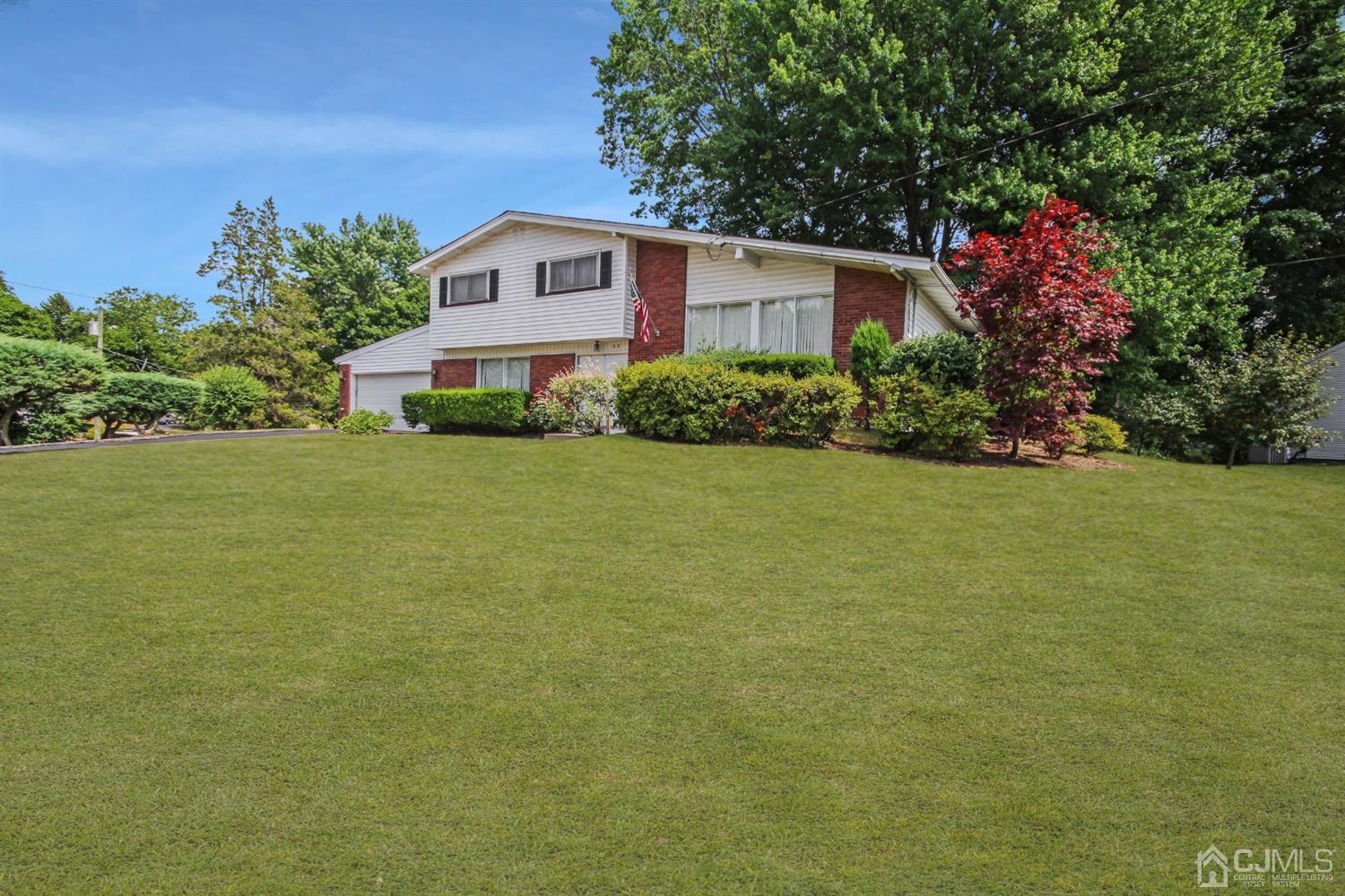 a house view with a garden space