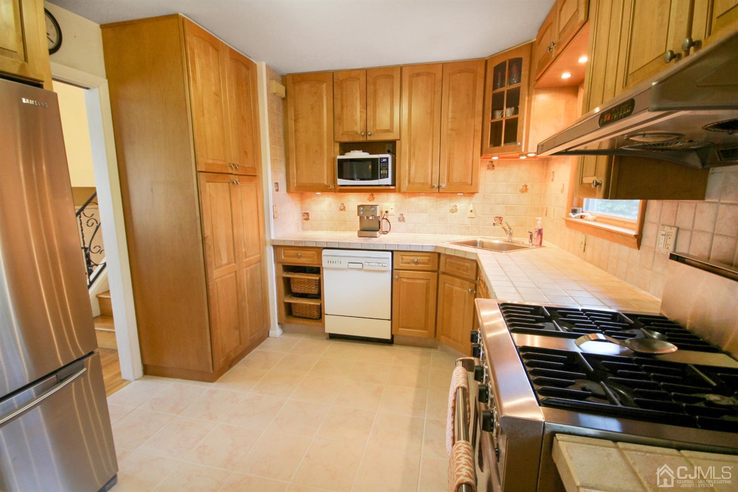 22 Bruning Road East Brunswick, NJ 08816 - Photo 16 of 31 a kitchen with a sink and appliances