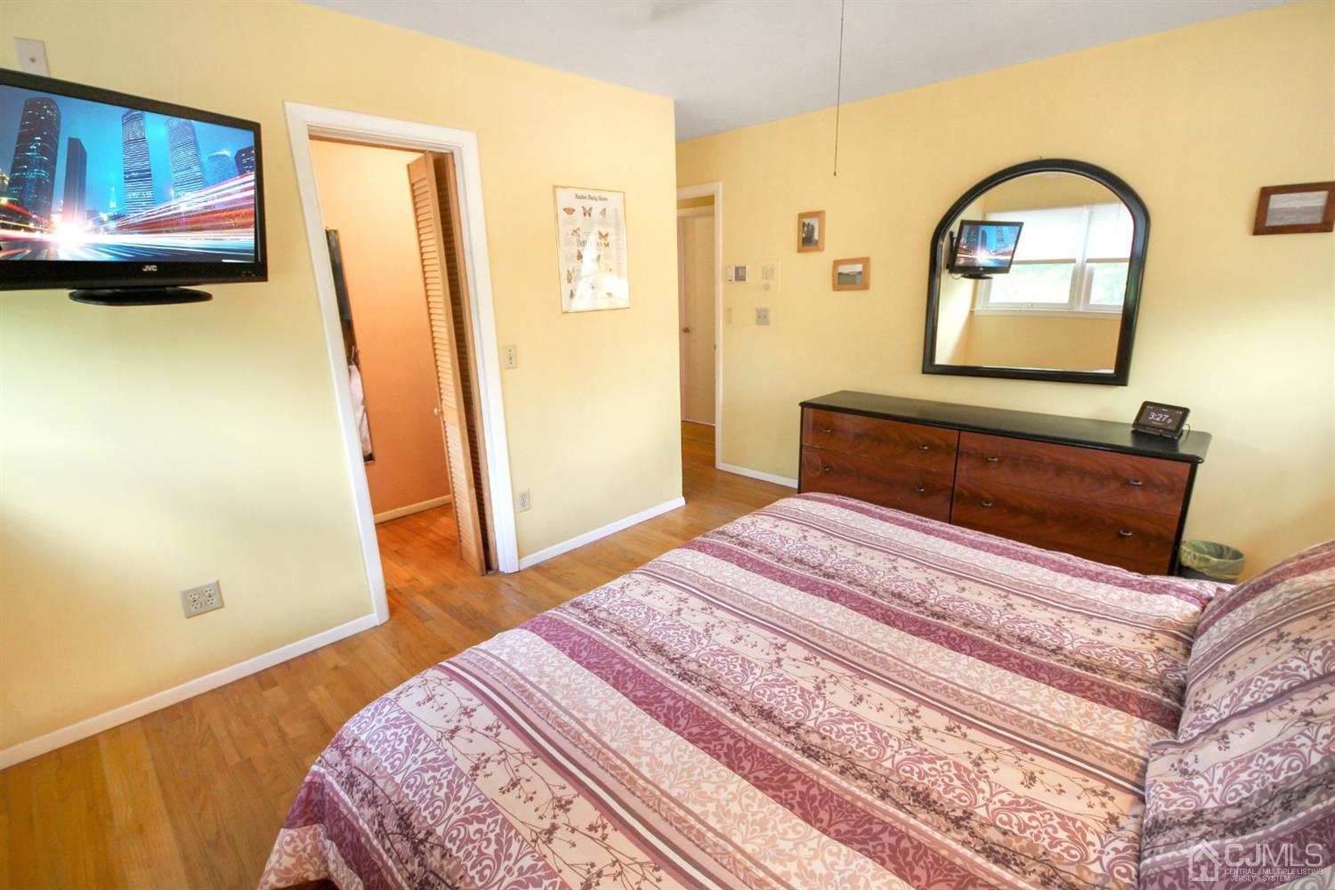 22 Bruning Road East Brunswick, NJ 08816 - Photo 22 of 31 a bedroom with a bed and a window