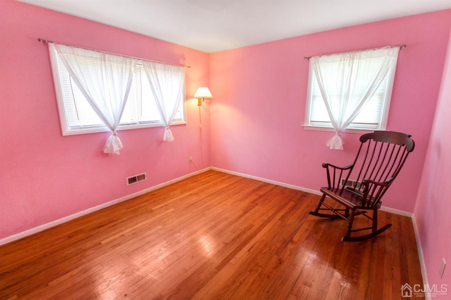 22 Bruning Road East Brunswick, NJ 08816 - Photo 25 of 31 a view of a room with wooden floor and a window