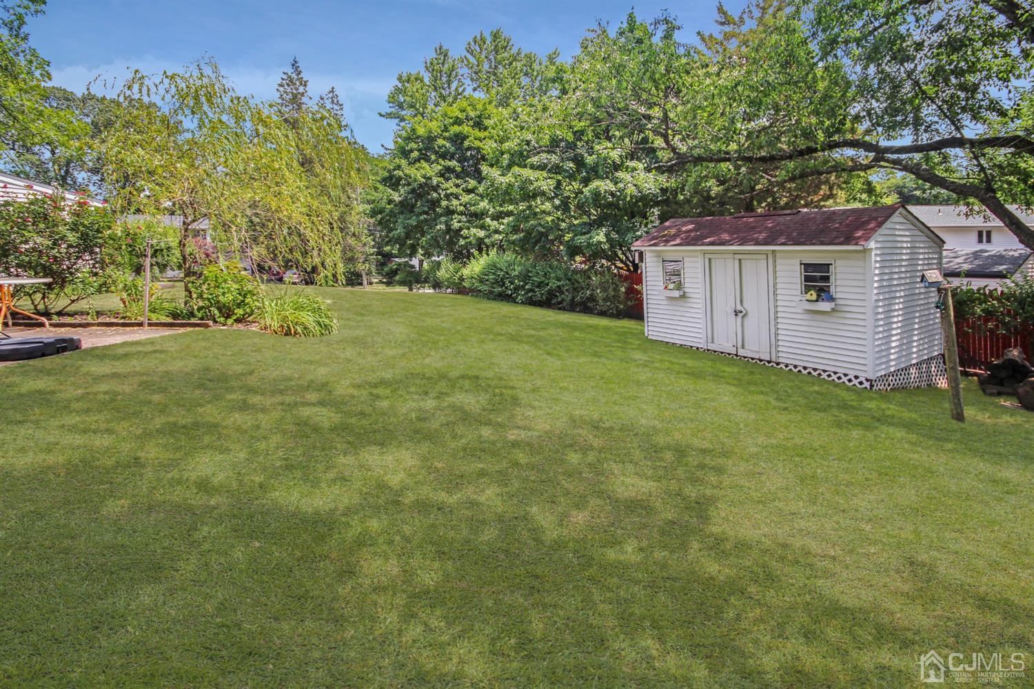 22 Bruning Road East Brunswick, NJ 08816 - Photo 7 of 31 a view of a house with a yard