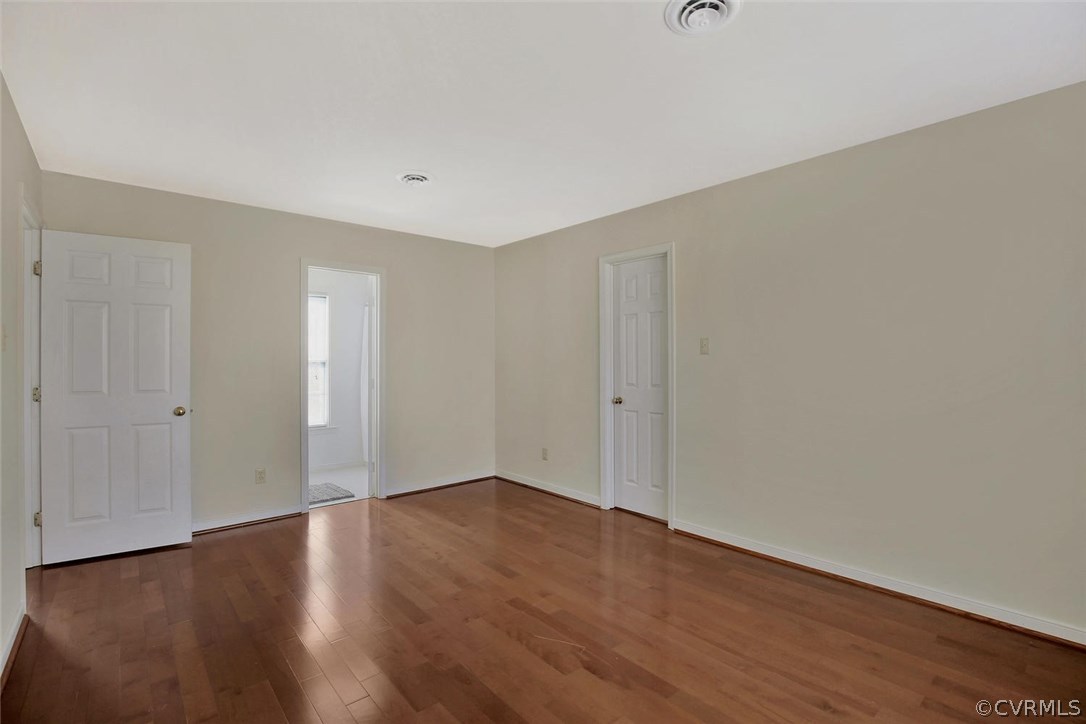 4732 Cedar Cliff Road Chester, VA 23831 - Photo 16 of 25 a view of an empty room with wooden floor