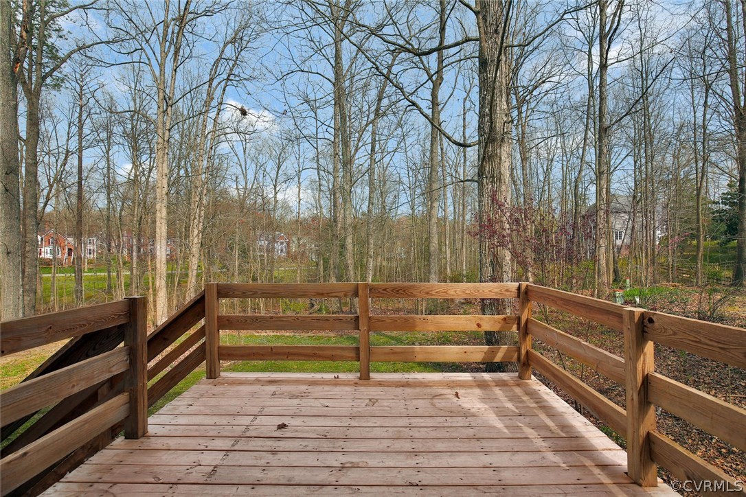 4732 Cedar Cliff Road Chester, VA 23831 - Photo 21 of 25 a view of entryway with wooden floor and fence