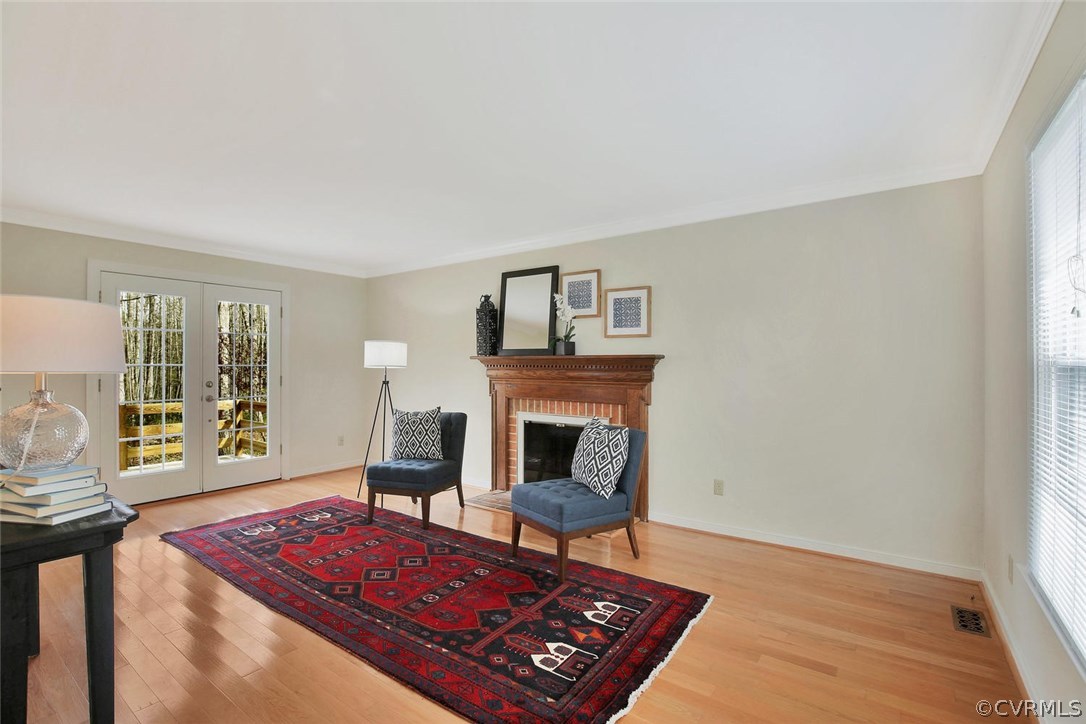 4732 Cedar Cliff Road Chester, VA 23831 - Photo 4 of 25 a living room with furniture and a fireplace