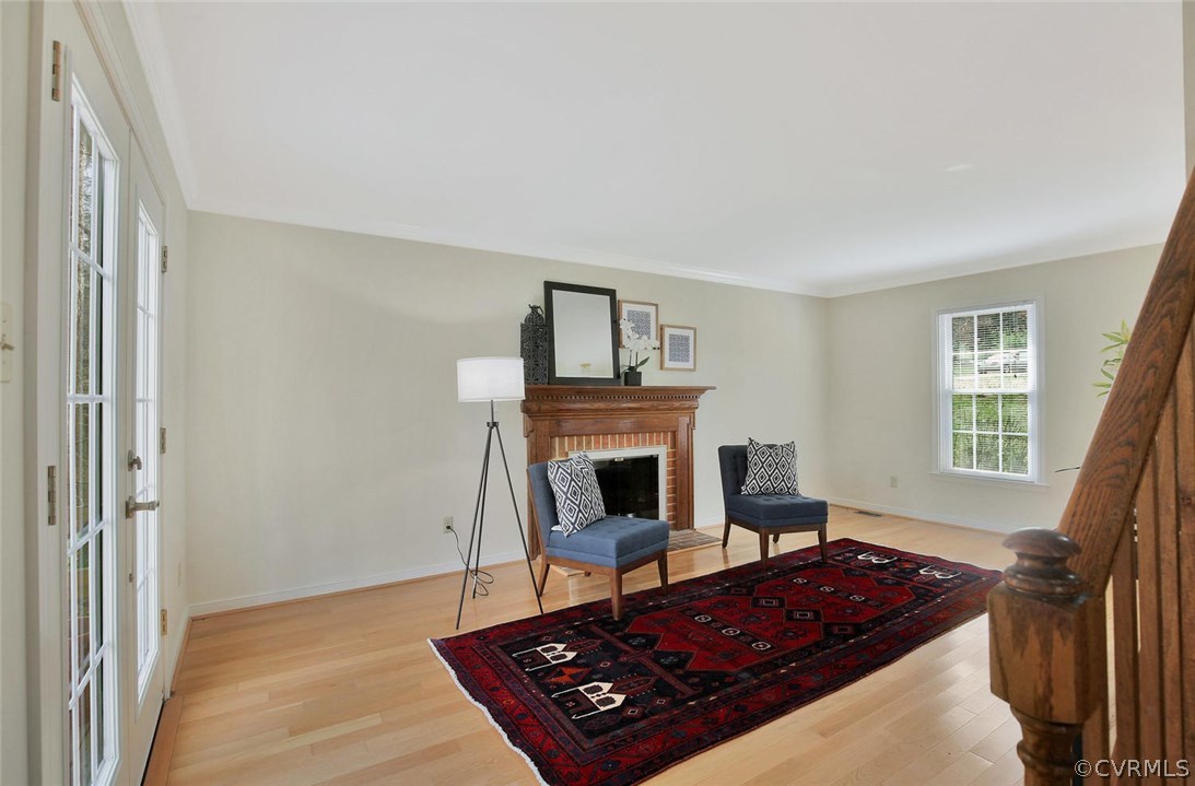 4732 Cedar Cliff Road Chester, VA 23831 - Photo 5 of 25 a living room with furniture and a fireplace