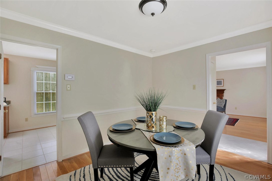 4732 Cedar Cliff Road Chester, VA 23831 - Photo 7 of 25 a view of a dining room with furniture and wooden floor