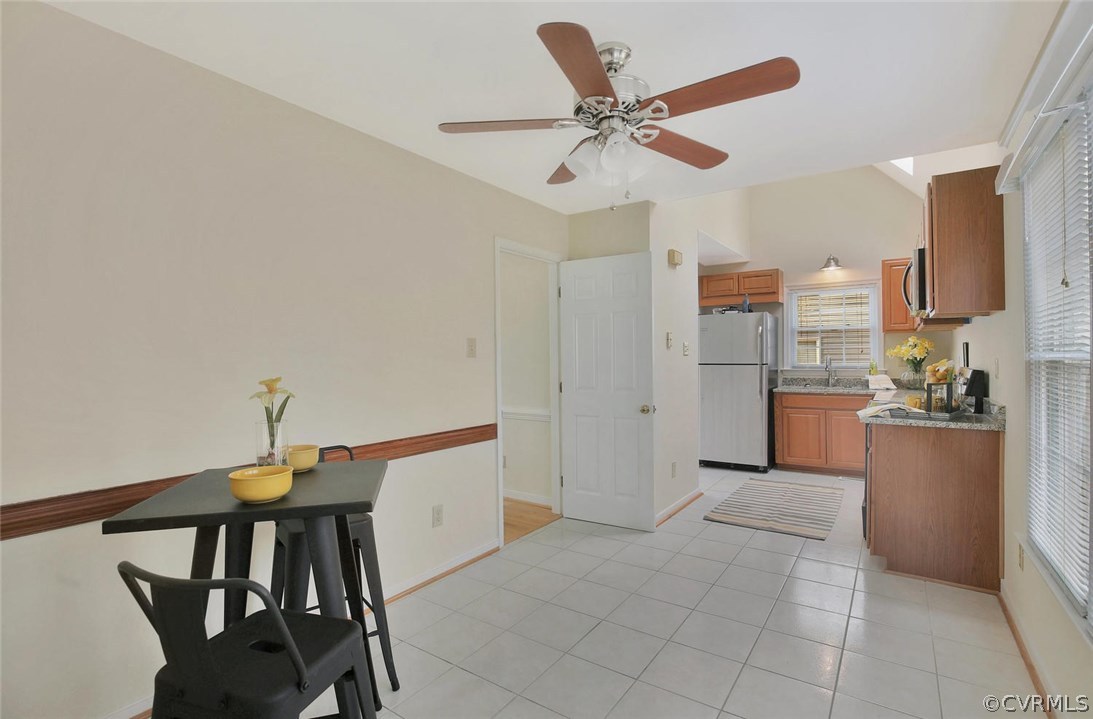 4732 Cedar Cliff Road Chester, VA 23831 - Photo 8 of 25 a view of a kitchen with a table and chairs