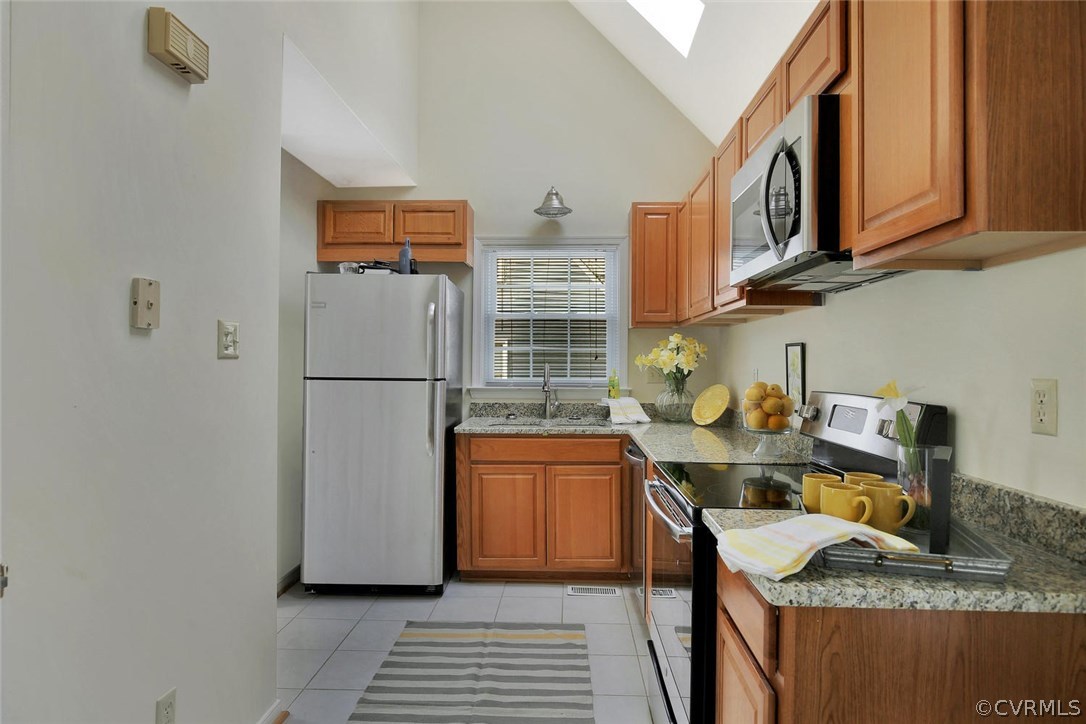 4732 Cedar Cliff Road Chester, VA 23831 - Photo 10 of 25 a view of kitchen with stainless steel appliances granite countertop refrigerator stove top oven and sink