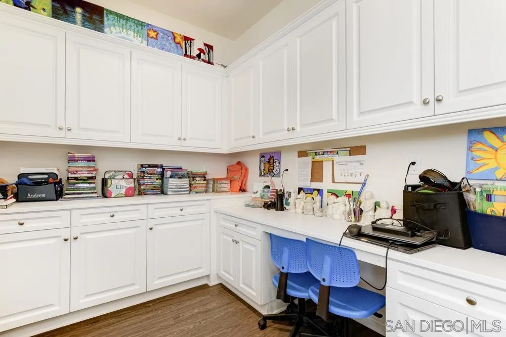 3684 Tavara Circle San Diego, CA 92117 - Photo 7 of 22 a kitchen with sink cabinets and appliances