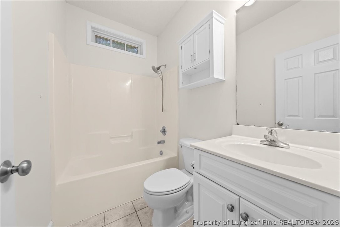 60 Spring Lake Drive Pinehurst, NC 28374 - Photo 23 of 42 a bathroom with a sink toilet and shower
