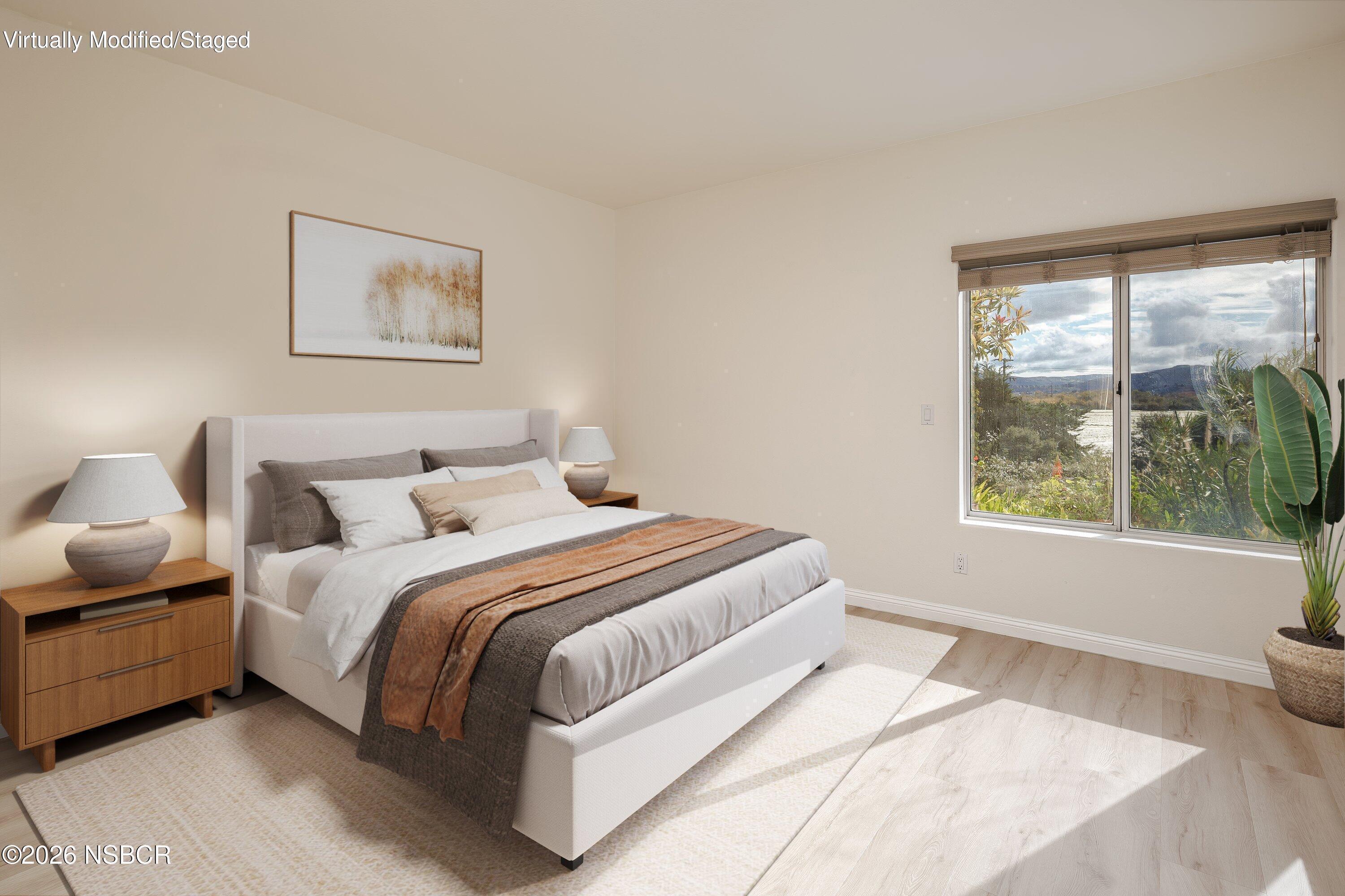 2655 Adobe Falls Road Lompoc, CA 93436 - Photo 32 of 51 a bedroom with bed and a large window