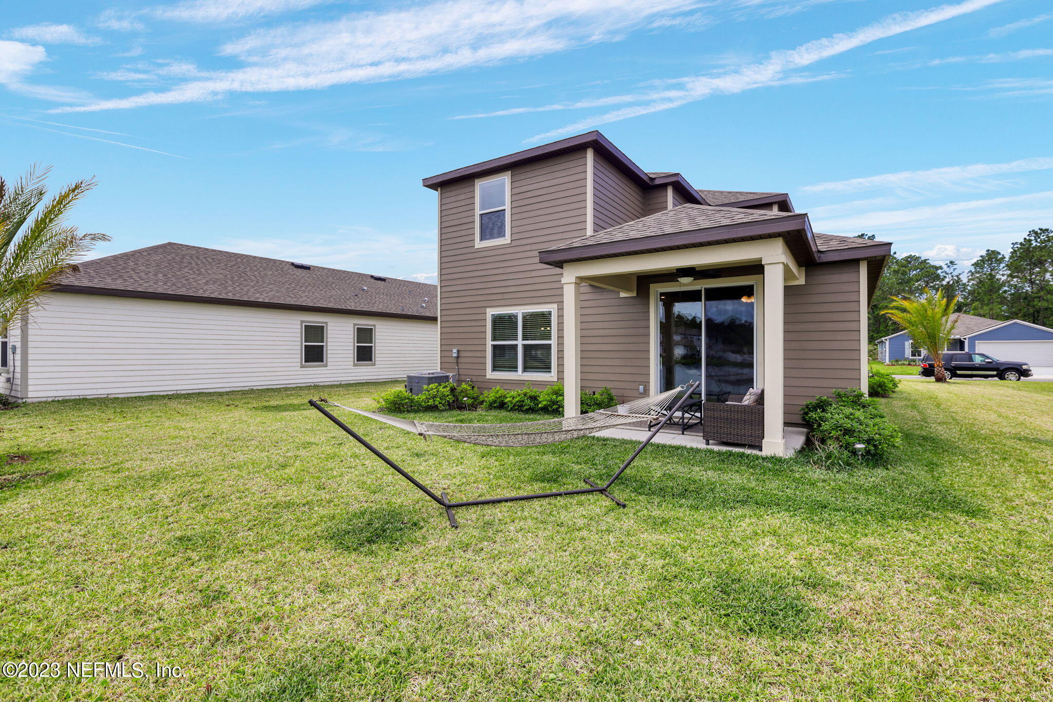 427 Falcon Ridge Road St. Augustine, FL 32084 - Photo 30 of 45 a view of a house with a backyard