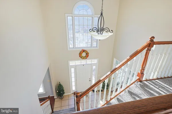 a view of a hallway with a staircase