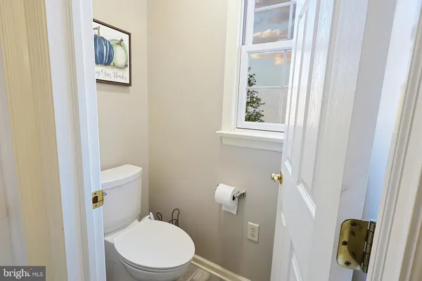 a view of storage and utility room with washer and dryer