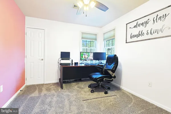 a view of a room with an empty space