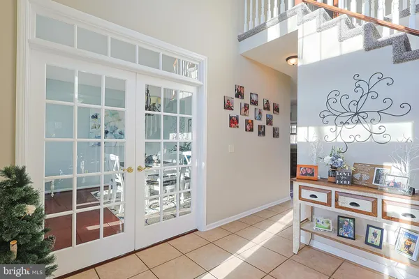 a kitchen with stainless steel appliances granite countertop a sink stove and microwave