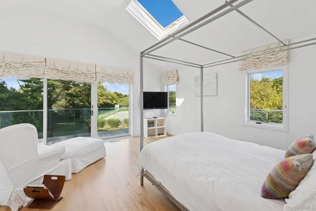 an aerial view of residential house with outdoor space and swimming pool