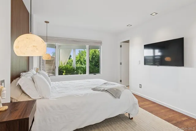 an aerial view of a house with a garden