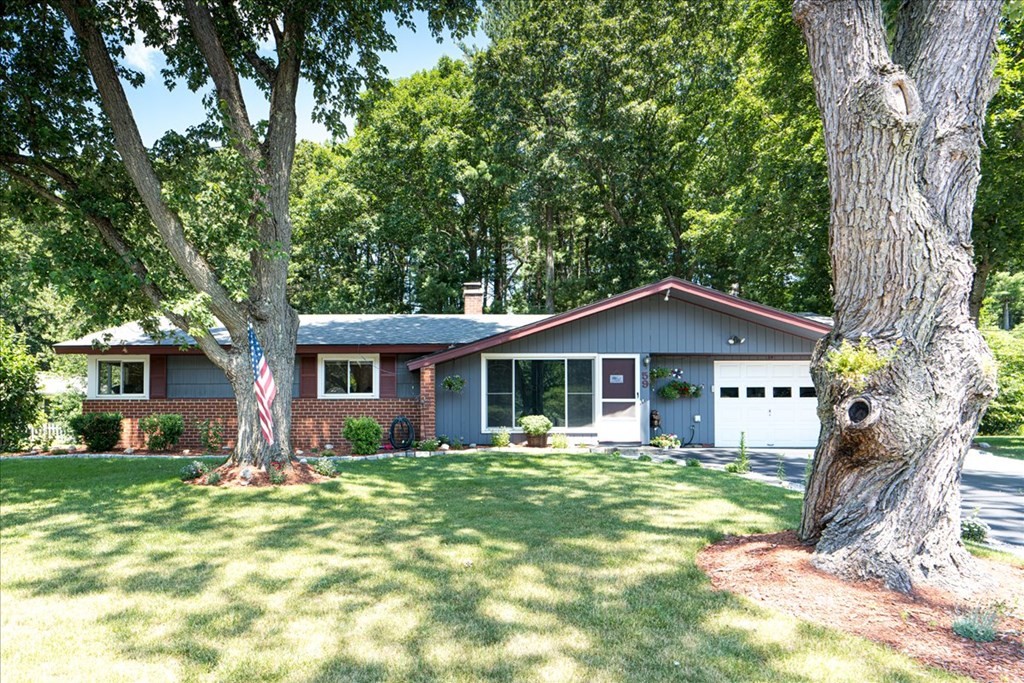 59 Eaton Road Framingham, MA 01701 - Photo 1 of 21 a front view of house with yard and green space