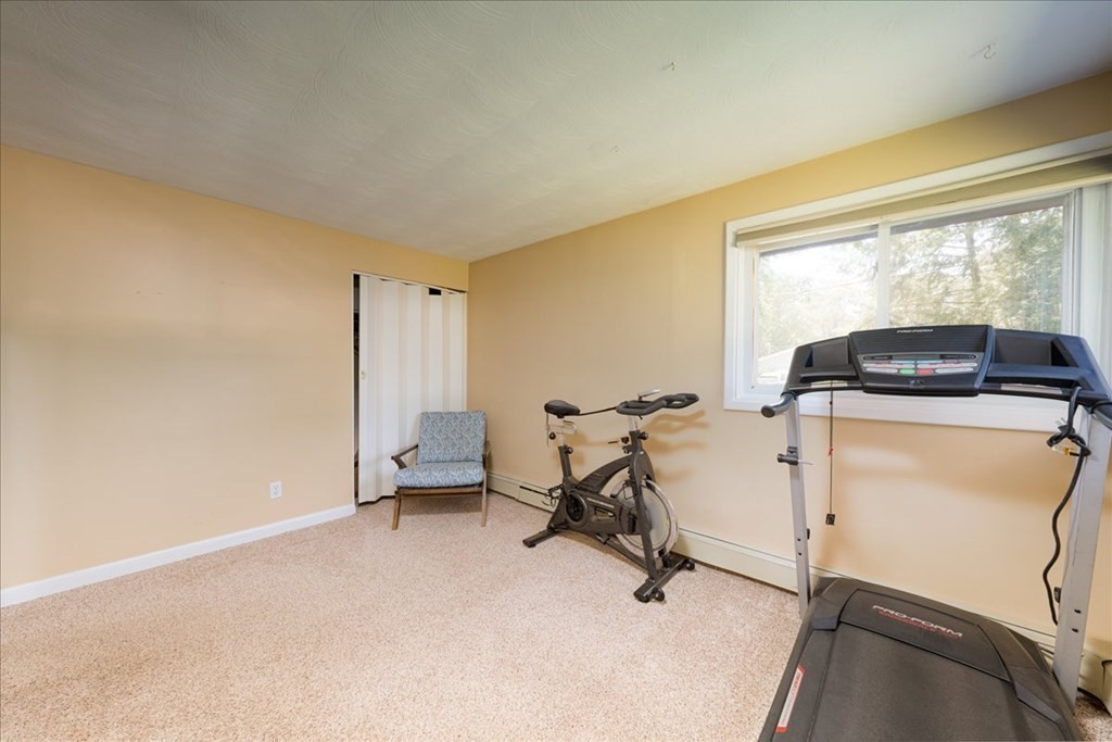 59 Eaton Road Framingham, MA 01701 - Photo 13 of 21 a view of a room with gym equipment