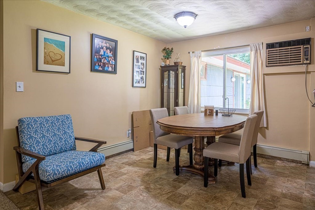 59 Eaton Road Framingham, MA 01701 - Photo 6 of 21 a view of a livingroom with furniture and window