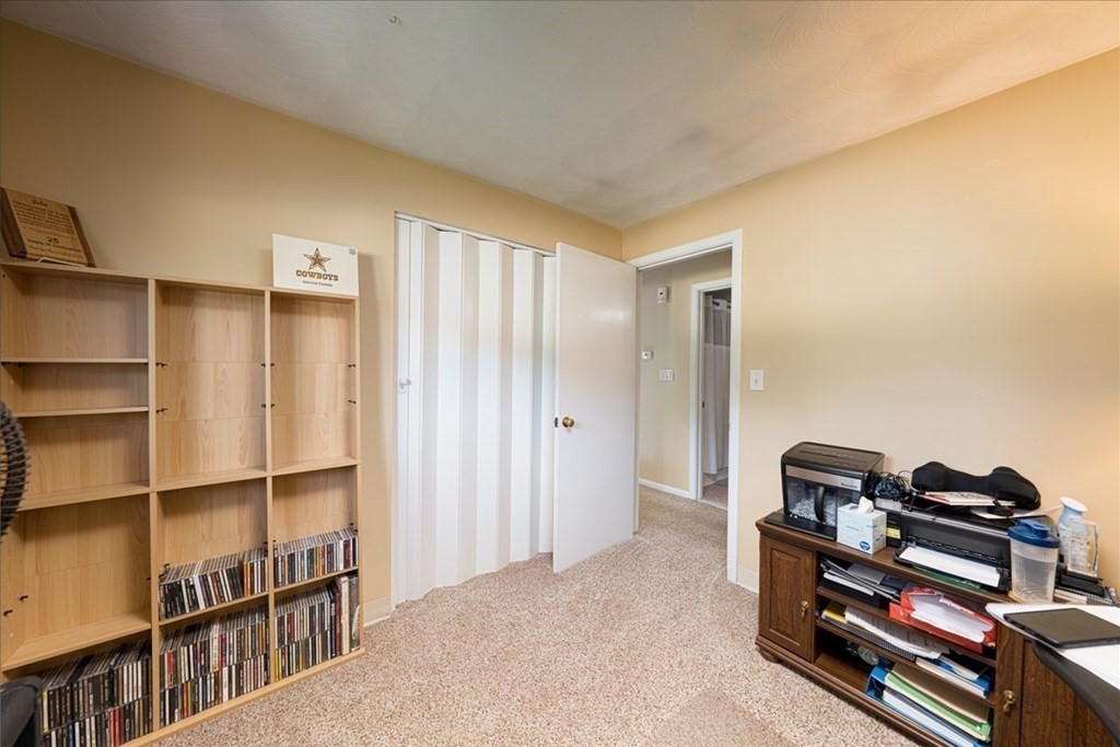 59 Eaton Road Framingham, MA 01701 - Photo 10 of 21 a view of a workspace with furniture