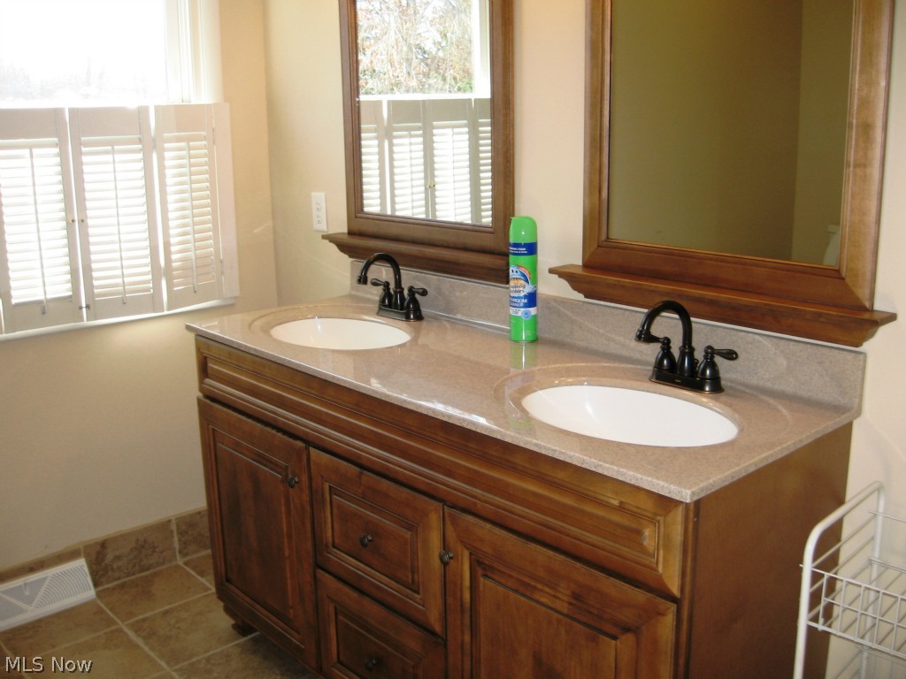 3609 Tallmadge Road Kent, OH 44240 - Photo 20 of 25 2nd level guest bath with tiled floor (updated 1/2 bath is on main level)