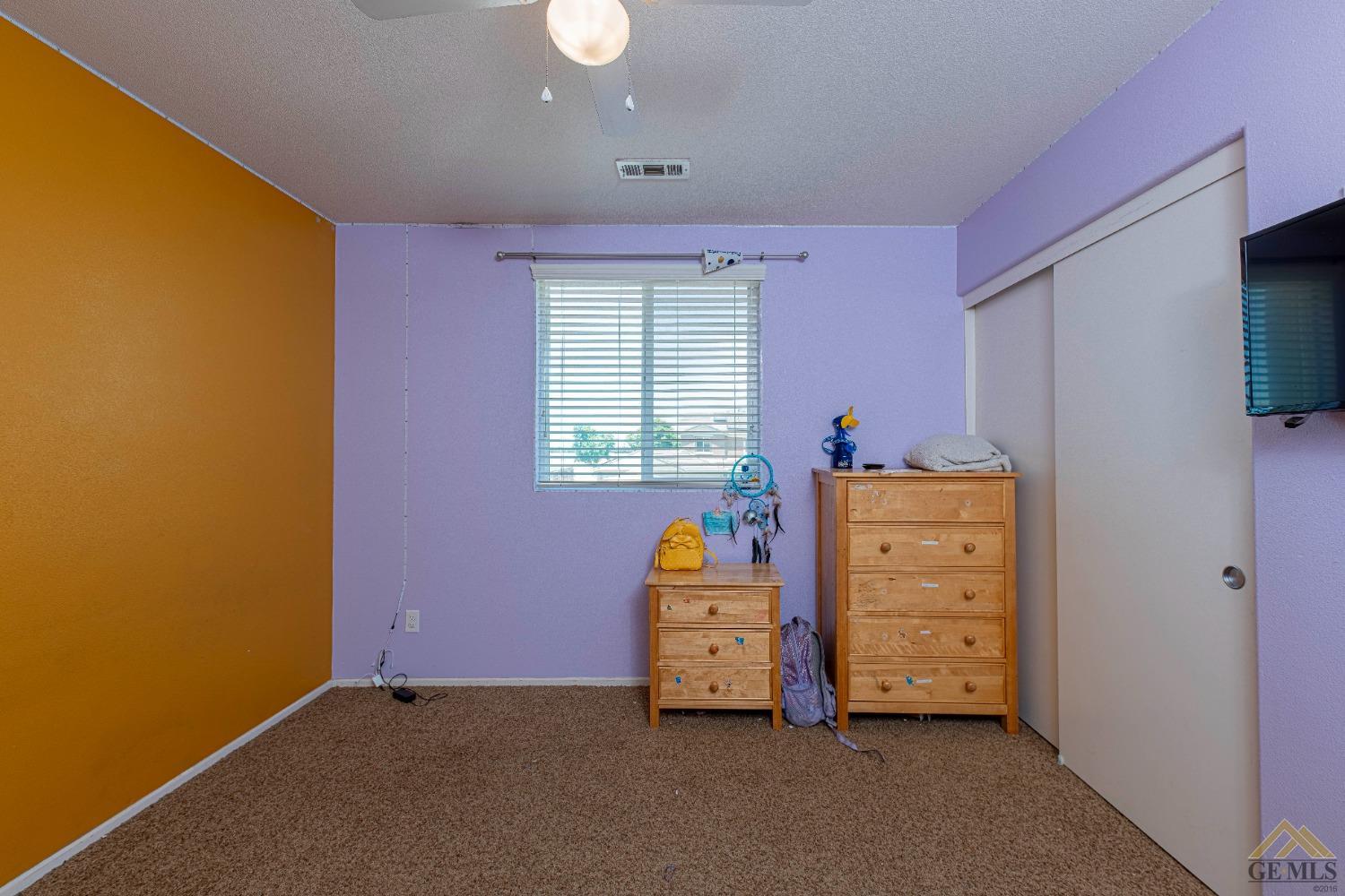 Undisclosed Address Bakersfield, CA 93314 - Photo 28 of 49 a room with toys and flat screen tv