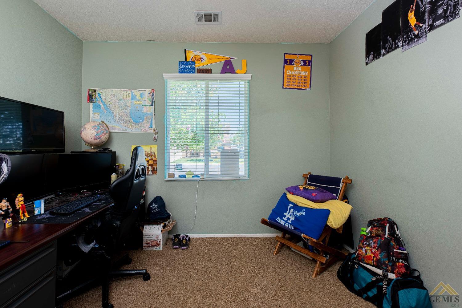 Undisclosed Address Bakersfield, CA 93314 - Photo 33 of 49 a room with toys and a window