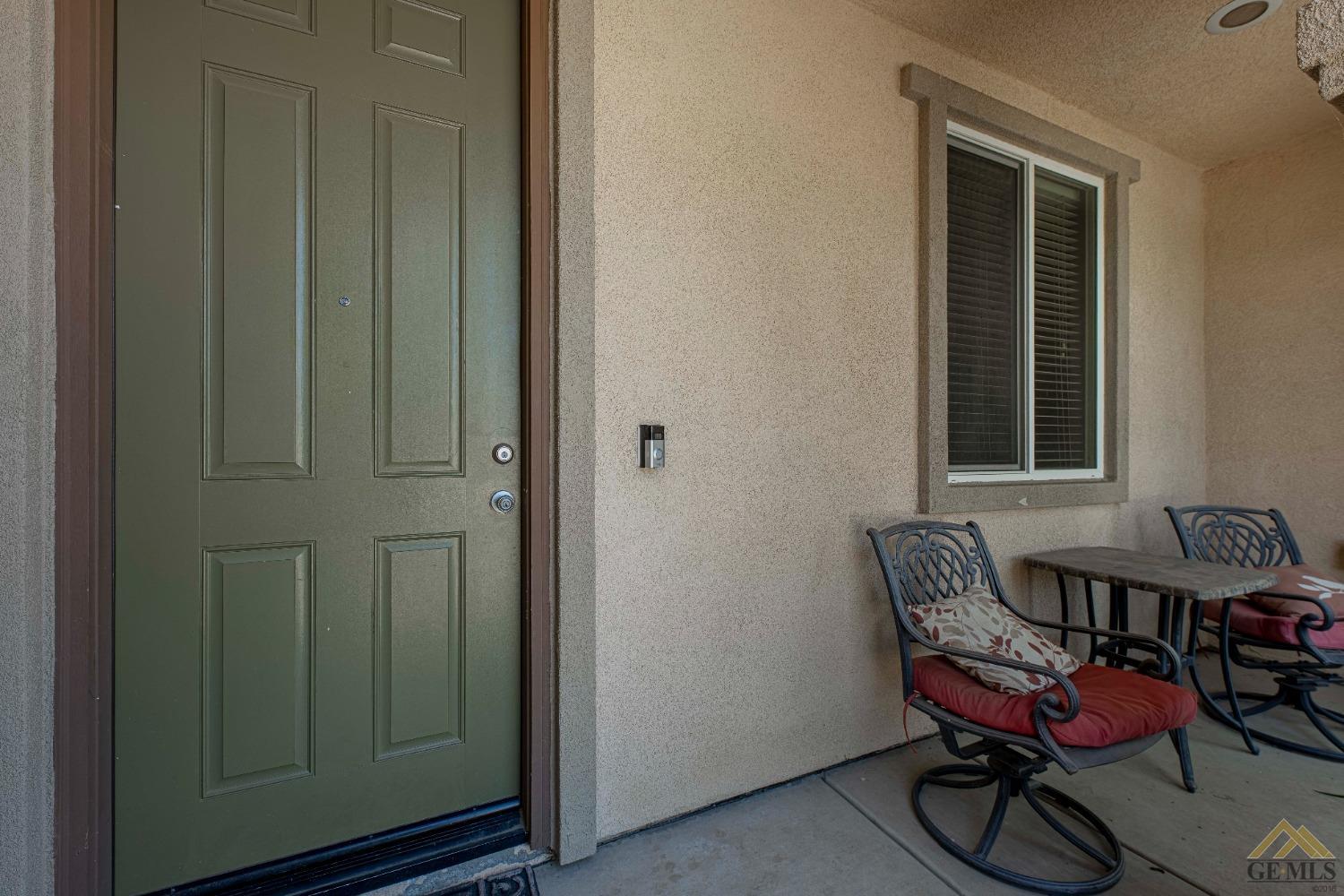Undisclosed Address Bakersfield, CA 93314 - Photo 7 of 49 a living room with furniture and a window