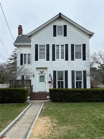 a house view with a garden space