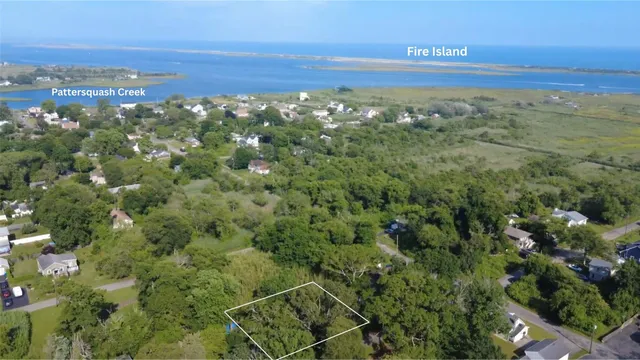 a view of a city with an ocean