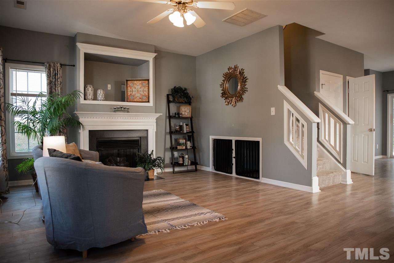 5848 Forest Point Road Raleigh, NC 27610 - Photo 21 of 21 Open floorplan with a gas fireplace and a "Pooch Palace"