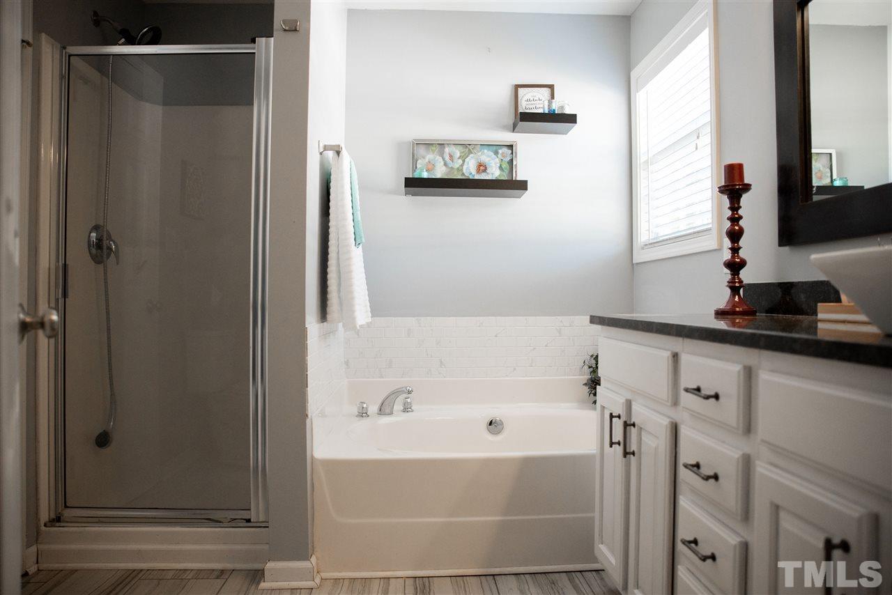 5848 Forest Point Road Raleigh, NC 27610 - Photo 10 of 21 Get ready to relax and soak in your garden tub. Or take a quick rinse in your separate shower.