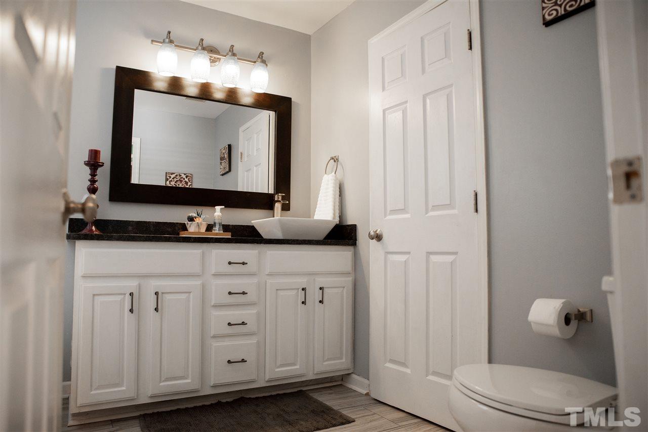 5848 Forest Point Road Raleigh, NC 27610 - Photo 9 of 21 Oversized vanity with plenty of storage.