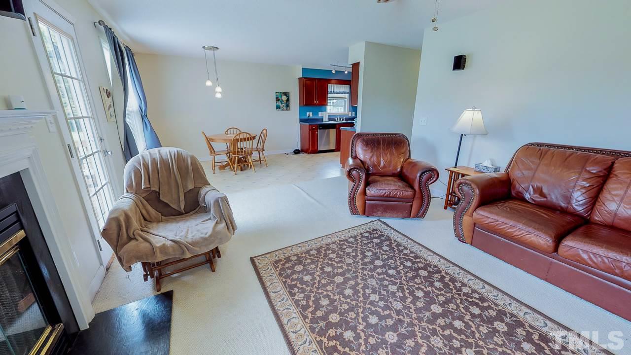 1130 Willie Gray Road Timberlake, NC 27583 - Photo 3 of 27 a living room with furniture and a couch
