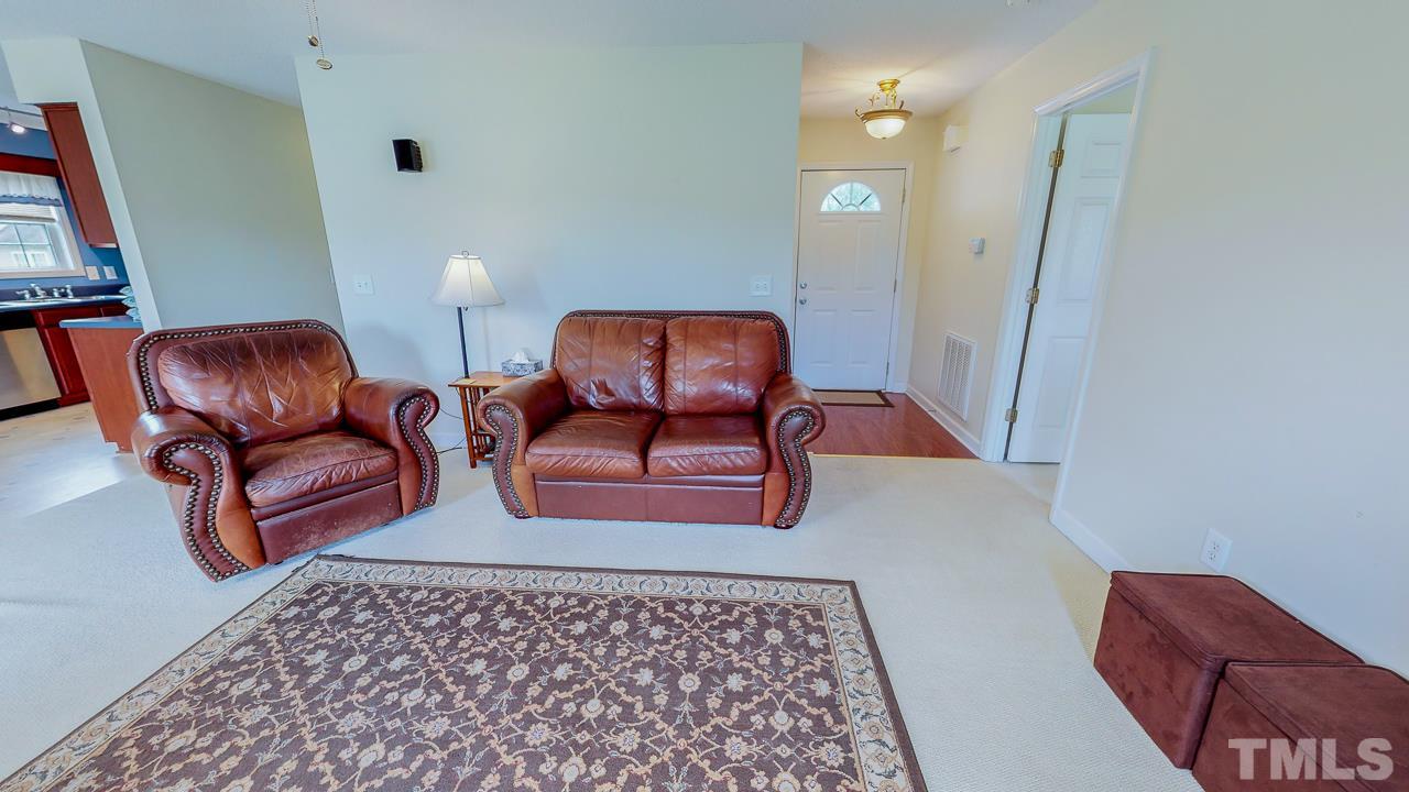 1130 Willie Gray Road Timberlake, NC 27583 - Photo 5 of 27 a living room with furniture