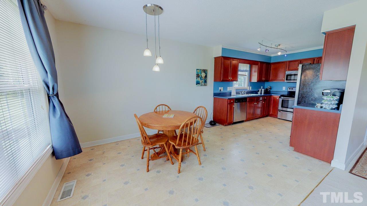 1130 Willie Gray Road Timberlake, NC 27583 - Photo 6 of 27 a outdoor space with chairs
