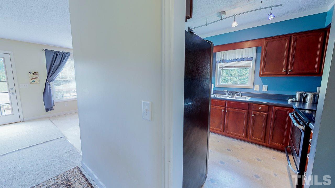 1130 Willie Gray Road Timberlake, NC 27583 - Photo 9 of 27 a view of hallway with window and stairs