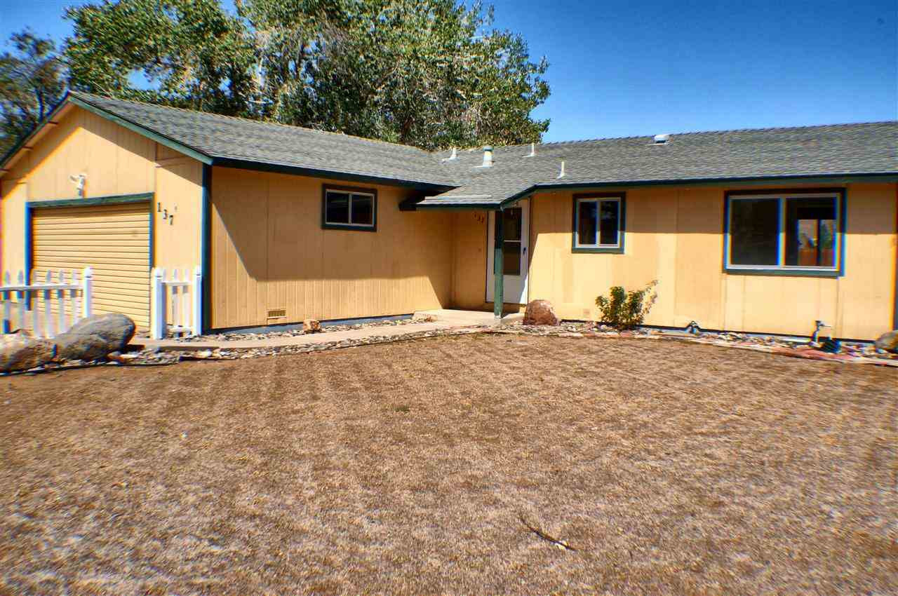 137 Ring Road Dayton, NV 89403 - Photo 1 of 1 a view of a house with backyard and sitting area