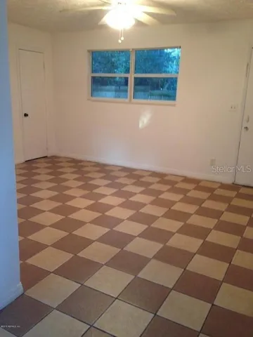 a view of a black and white checkered floor