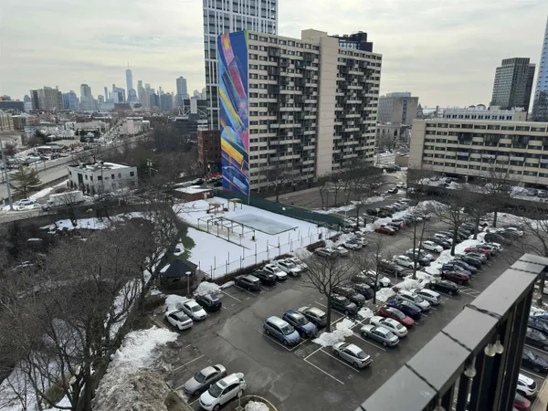 a view of a city with tall buildings